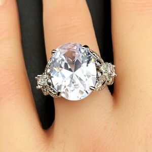 .925 Sterling Silver with Large Oval White Diamond Cubic Zirconia Ring Size 9